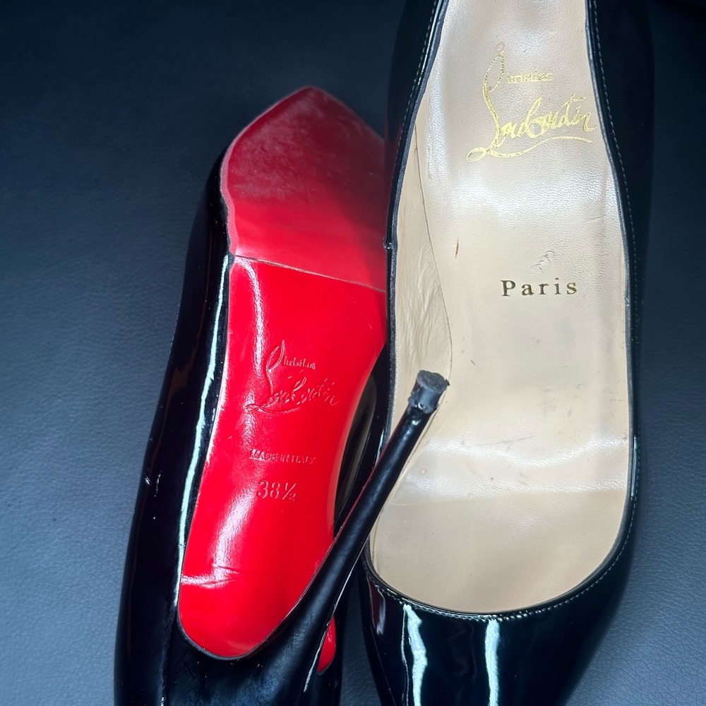 Christian Louboutin
So Kate Patent Pointed-Toe Red Sole Pump